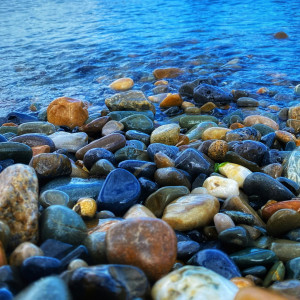 Stack of smooth river stones representing stones of remembrance.